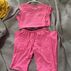 1 pair of pink scrubs